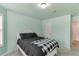 Bedroom with natural light and calming wall color at 1548 Station Ridge Dr, Lawrenceville, GA 30045