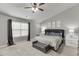 Light-filled main bedroom with vaulted ceilings and soft, neutral decor at 1548 Station Ridge Dr, Lawrenceville, GA 30045