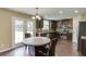 Spacious eat-in kitchen boasts backyard views and stainless steel appliances at 1548 Station Ridge Dr, Lawrenceville, GA 30045