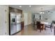 Kitchen boasts stainless steel appliances and views into the living room at 1548 Station Ridge Dr, Lawrenceville, GA 30045