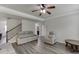 Living room features include gray wood flooring and modern neutral decor at 1548 Station Ridge Dr, Lawrenceville, GA 30045