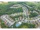 Aerial view of a well-planned neighborhood with mature trees and community amenities at 1548 Station Ridge Dr, Lawrenceville, GA 30045