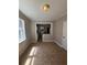 Dining area featuring neutral paint and tiled flooring leading to the kitchen at 2103 River Rd, Ellenwood, GA 30294