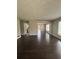 Inviting living area featuring hardwood floors, neutral walls, and ample space for versatile arrangements at 2830 Norgate Ln, Decatur, GA 30034