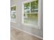 Bright bedroom featuring sunlit windows with blinds and neutral wall paint at 772 Aerial Se Way, Atlanta, GA 30312