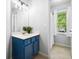 Bathroom features a vibrant vanity and shower at 908 Lance Cir, Lawrenceville, GA 30043