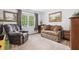 Bedroom features an oversized chair and settee for relaxing at 908 Lance Cir, Lawrenceville, GA 30043