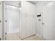 Mud room with tiled flooring, built in storage, and access to the exterior at 908 Lance Cir, Lawrenceville, GA 30043