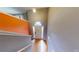 Bright foyer with hardwood floors and a striking accent wall at 95 Willow Tree Ter, Covington, GA 30016