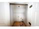 Laundry closet with bare floors and basic fixtures at 95 Willow Tree Ter, Covington, GA 30016