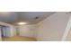 Spacious living room with neutral walls and carpet flooring at 95 Willow Tree Ter, Covington, GA 30016