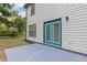 Backyard featuring a new patio and a set of French doors at 4000 Brittan Glade Trl, Snellville, GA 30039