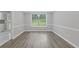 Dining area with updated flooring, trim, and paint at 4000 Brittan Glade Trl, Snellville, GA 30039