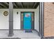 Inviting bright blue front door with sidelights and stylish hardware at 4000 Brittan Glade Trl, Snellville, GA 30039