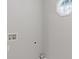 Minimalist wall with octagon window and connections for appliances at 4000 Brittan Glade Trl, Snellville, GA 30039
