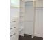 Closet with custom built-in shelving and drawers providing ample storage space and organization at 688 Harmony Rd, Temple, GA 30179