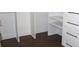 Closet with custom built-in shelving and drawers providing ample storage space and functionality at 688 Harmony Rd, Temple, GA 30179