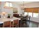 Bright kitchen island with a white countertop, seating, and a dining table at 688 Harmony Rd, Temple, GA 30179