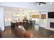 Combined open floor plan living room, kitchen, and dining area with lots of natural light at 688 Harmony Rd, Temple, GA 30179