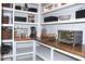 Organized pantry with shelving, countertop space, and various kitchen appliances at 688 Harmony Rd, Temple, GA 30179