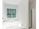 Bright bathroom with a luxurious soaking tub and separate shower at 125 Ashbury Ct, Dallas, GA 30157