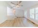 Sun-filled living room with vaulted ceilings and luxury vinyl plank flooring at 125 Ashbury Ct, Dallas, GA 30157