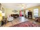 Bright living room with hardwood floors, neutral paint, and comfortable seating at 1919 Cheatham Woods Sw Dr, Marietta, GA 30008