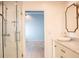 Tastefully designed bathroom featuring a glass shower and large vanity at 3050 Baymount Dr, Lawrenceville, GA 30043