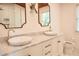 Stylish bathroom with double sinks, marble countertop, and modern fixtures at 3050 Baymount Dr, Lawrenceville, GA 30043