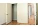 Bedroom view featuring open closet and hardwood floors at 3050 Baymount Dr, Lawrenceville, GA 30043