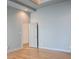 Spacious bedroom with hardwood floors and access to an additional room at 3050 Baymount Dr, Lawrenceville, GA 30043