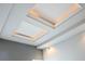 Unique tray ceiling with recessed lighting adding elegance to the room at 3050 Baymount Dr, Lawrenceville, GA 30043