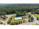 An aerial view of a community pool with a playground at 3050 Baymount Dr, Lawrenceville, GA 30043