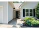 Close-up of the front entrance with tidy landscaping and a well-kept walkway leading to the door at 3050 Baymount Dr, Lawrenceville, GA 30043