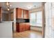 Kitchenette features custom cabinetry, modern lighting, and a window offering natural light at 3050 Baymount Dr, Lawrenceville, GA 30043