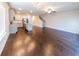 Spacious open-concept living space with hardwood floors and kitchen at 3375 Highbury Way, Lithonia, GA 30038