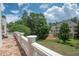 A large balcony offers an expansive view of the professionally landscaped backyard at 4054 Lyon Blvd, Atlanta, GA 30331