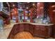 Custom bar area with granite countertops, wine racks, and dark wood cabinetry at 4054 Lyon Blvd, Atlanta, GA 30331
