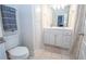 Bright bathroom with a double sink vanity, a tiled floor, and a shower at 4054 Lyon Blvd, Atlanta, GA 30331