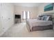Serene bedroom with carpet, neutral tones, and a comfortable queen-sized bed at 4054 Lyon Blvd, Atlanta, GA 30331
