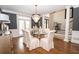 Elegant dining room with chandelier, hardwood floors, and staircase access to the second floor at 4054 Lyon Blvd, Atlanta, GA 30331
