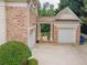 Spacious two car garage and breezeway highlighted with brick and trim at 4054 Lyon Blvd, Atlanta, GA 30331