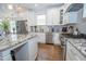 Well-equipped kitchen with stainless steel appliances, granite countertops, and white cabinetry at 4054 Lyon Blvd, Atlanta, GA 30331