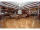 Spacious living room with hardwood floors, coffered ceilings, and classic furnishings at 4054 Lyon Blvd, Atlanta, GA 30331