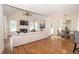 Open-concept living room with fireplace, hardwood floors, and plenty of natural light at 4054 Lyon Blvd, Atlanta, GA 30331
