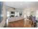 Open-concept living room with fireplace, hardwood floors, and plenty of natural light at 4054 Lyon Blvd, Atlanta, GA 30331