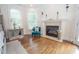 Main bedroom with hardwood floors and fireplace at 4054 Lyon Blvd, Atlanta, GA 30331