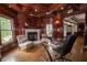 Cozy office with fireplace, dark wood paneling, and natural light at 4054 Lyon Blvd, Atlanta, GA 30331
