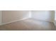 A bright bedroom with neutral carpet and walls provides a blank canvas for personalization at 4815 Price St, Forest Park, GA 30297