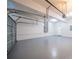 A spacious two car garage with an automatic door, overhead lighting and neutral colors at 4815 Price St, Forest Park, GA 30297